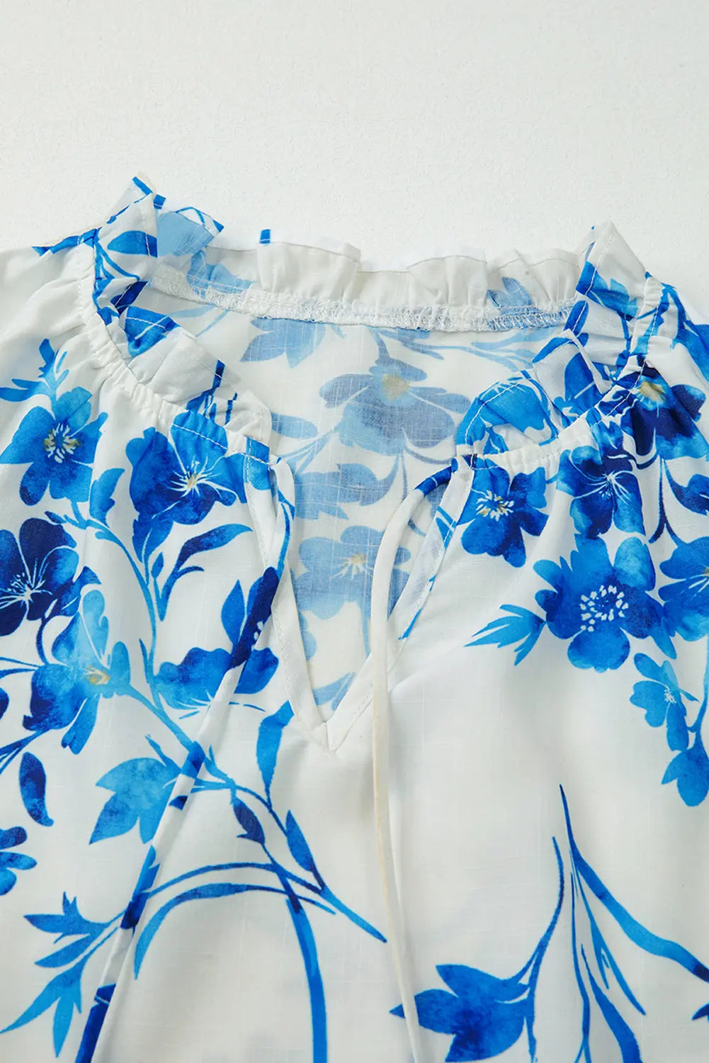 Blue Floral Long Sleeve Lace-up V Neck Blouse Shewin