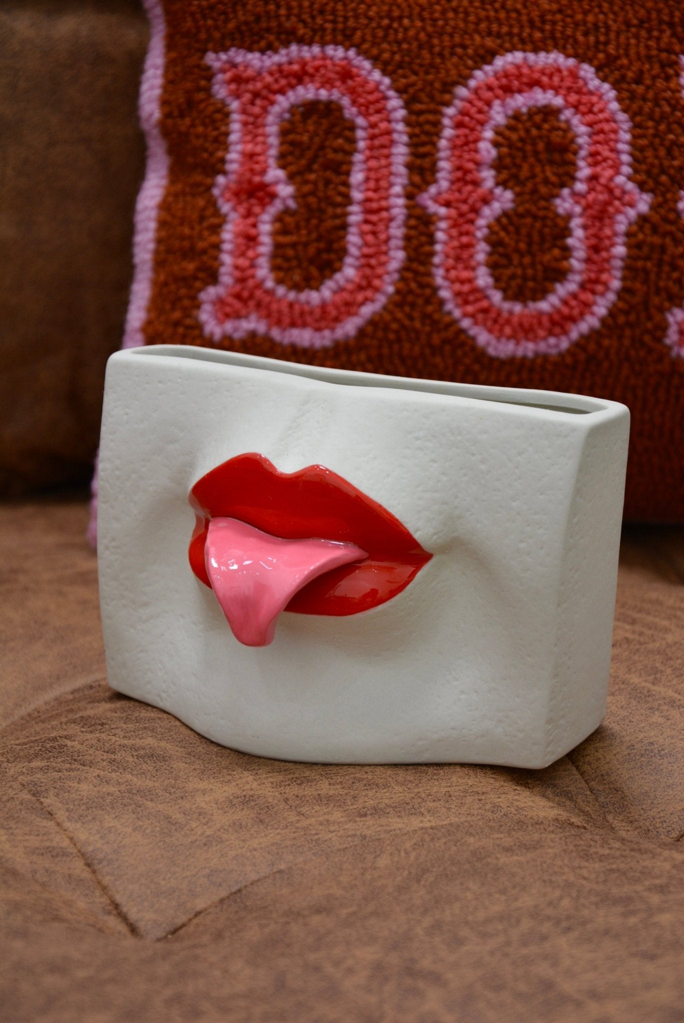 CERAMIC TONGUE-OUT VASE