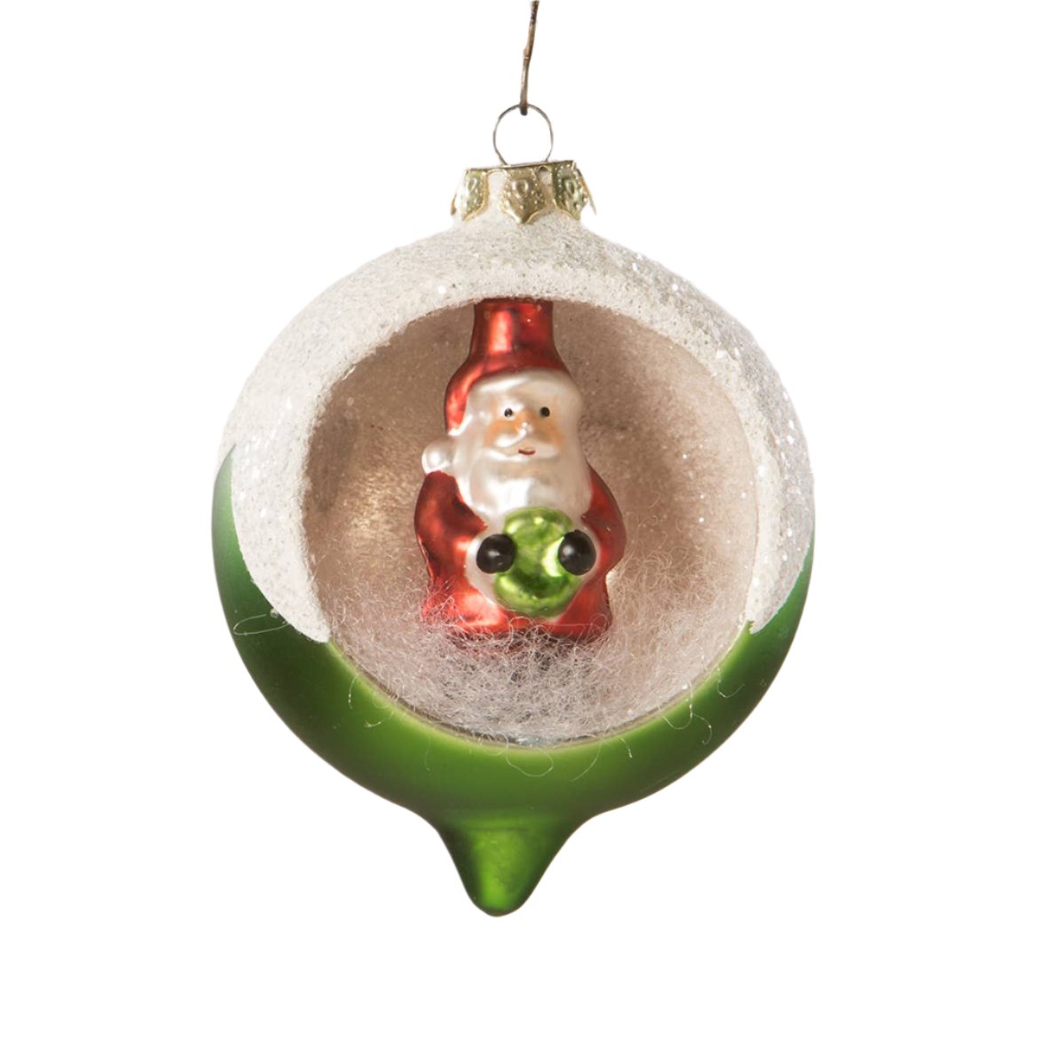 Christmas ornament with a Santa Claus figure inside a green glass ball on a white background