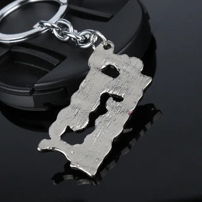 PUSSY WAGON Keychain with Letter Design