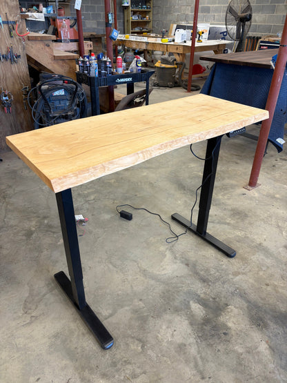 Adjustable height sit/stand pecan desk