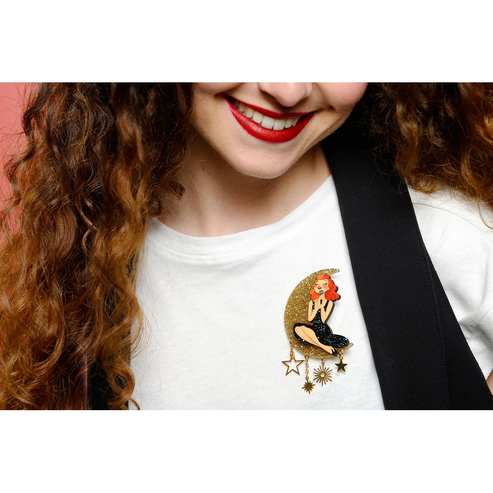 Singer sitting on the Moon Brooch by Laliblue Quirks!