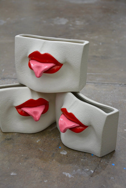 CERAMIC TONGUE-OUT VASE