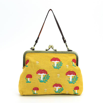 Mushrooms Kisslock Frame Handbag in Cotton: Black Quirks!