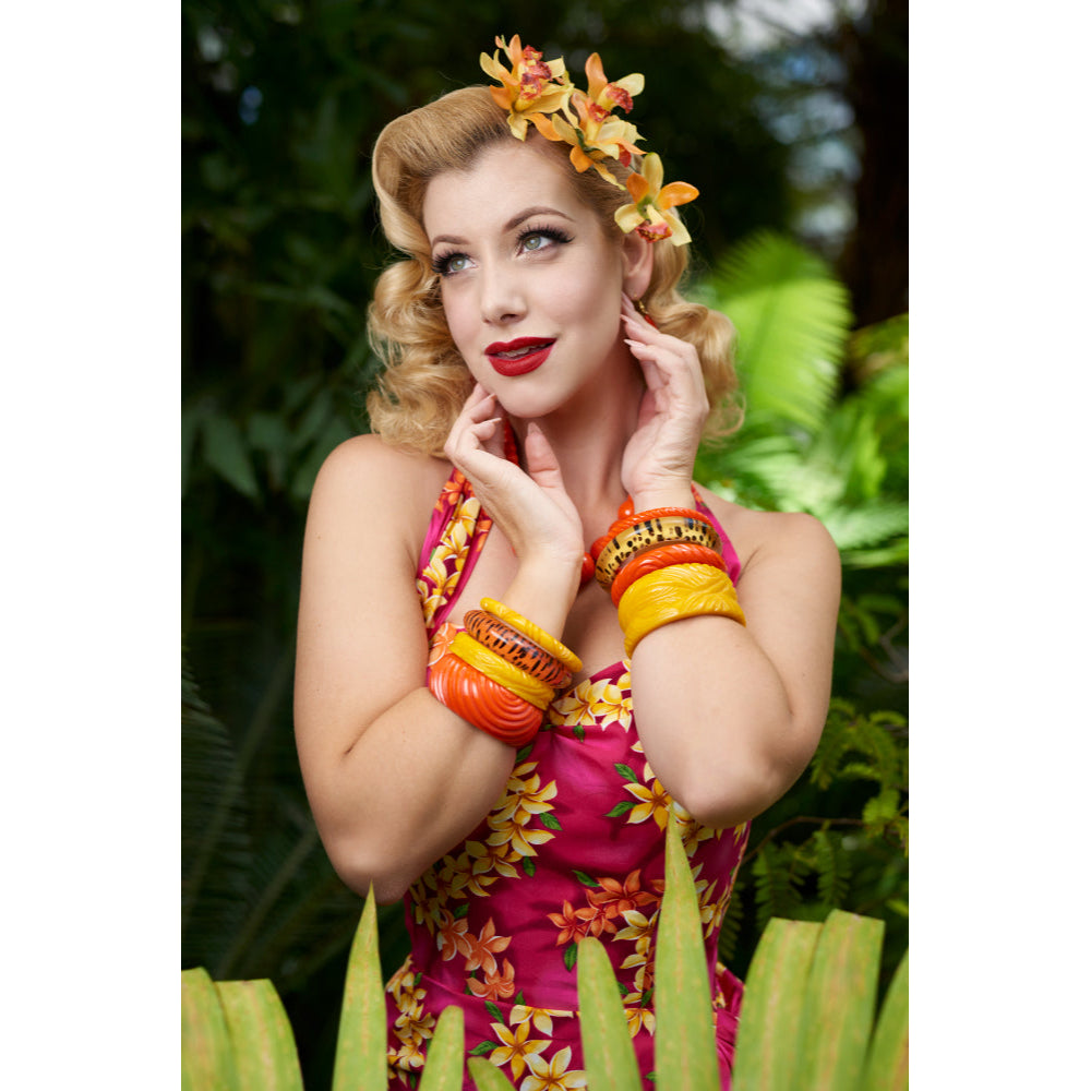 Wide Papaya Heavy Carve Fakelite Bangle by Splendette - MEDIUM