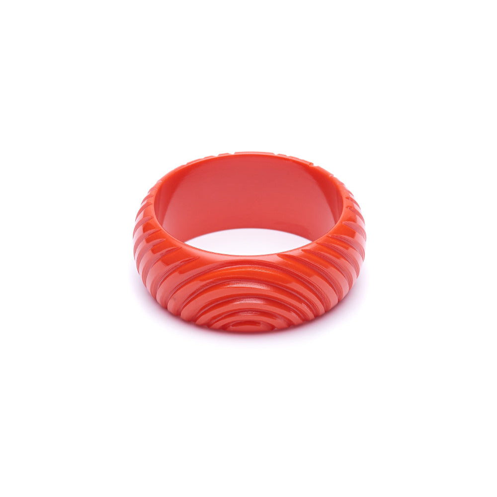 Wide Papaya Heavy Carve Fakelite Bangle by Splendette - MEDIUM