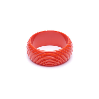 Wide Papaya Heavy Carve Fakelite Bangle by Splendette - MEDIUM