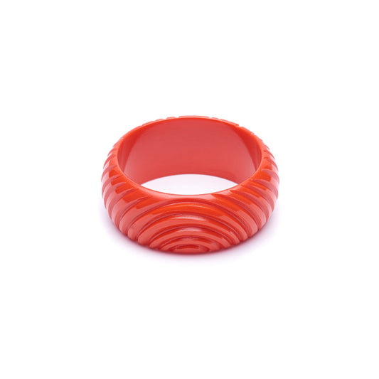 Wide Papaya Heavy Carve Fakelite Bangle by Splendette - MEDIUM